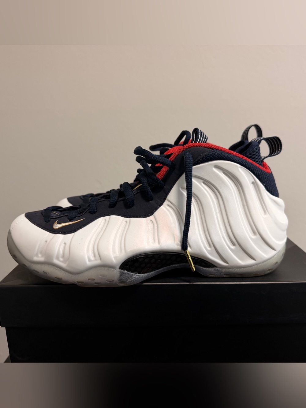 Nike mens Foam posits One Sneakers - Navy/White/Red with Gold Accent